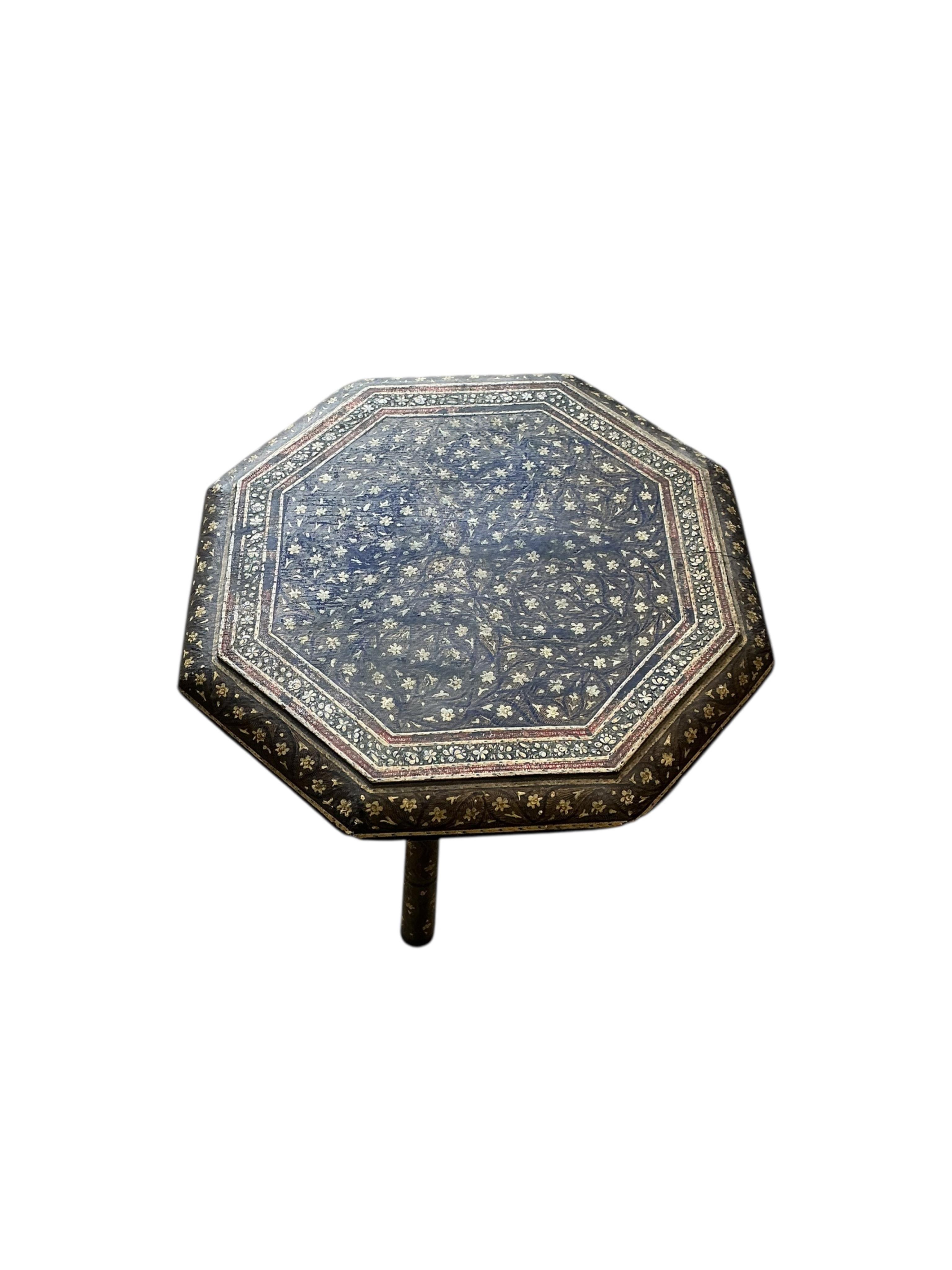 A small Damascan painted octagonal occasional table, width 30cm, height 34cm